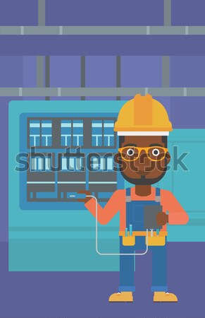 Electrician with electrical equipment. Stock photo © RAStudio