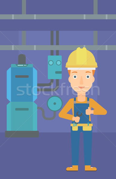 Cheerful repairer with spanner. Stock photo © RAStudio