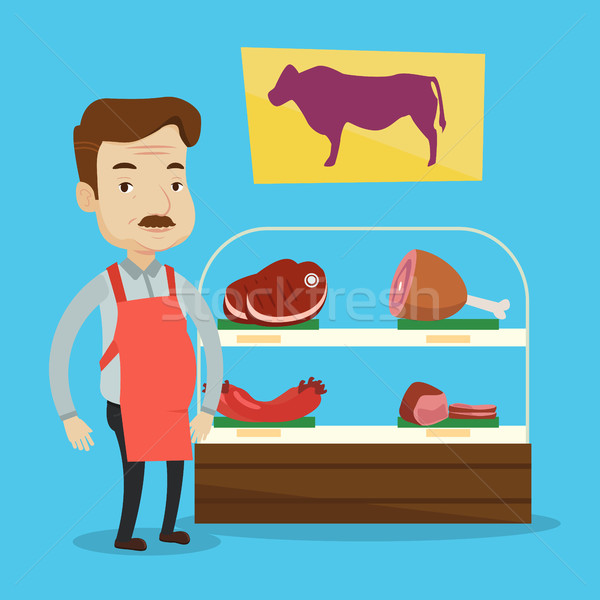 Butcher offering fresh meat in butchershop. Stock photo © RAStudio