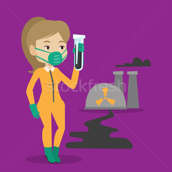 Woman in radiation protective suit with test tube. Stock photo © RAStudio
