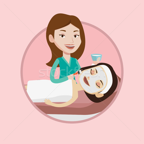 Woman in beauty salon during cosmetology procedure Stock photo © RAStudio