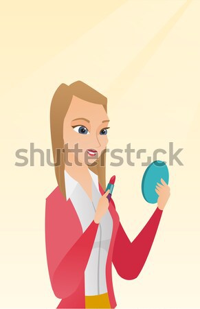 Woman rouge lips with red color lipstick. Stock photo © RAStudio