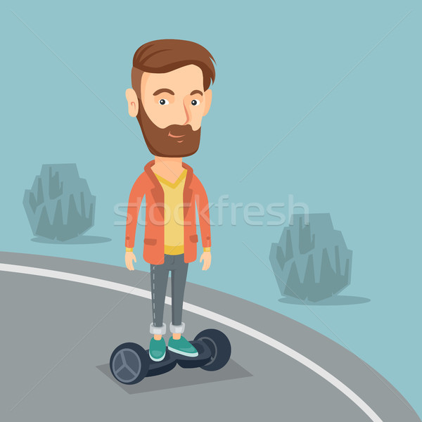 Man riding on self-balancing electric scooter. Stock photo © RAStudio