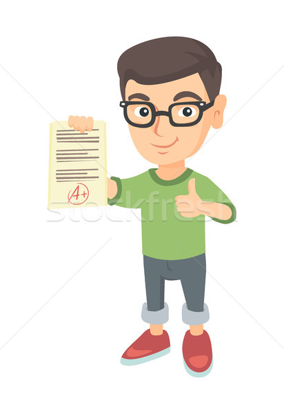 Pupil holding a sheet with the highest mark. Stock photo © RAStudio