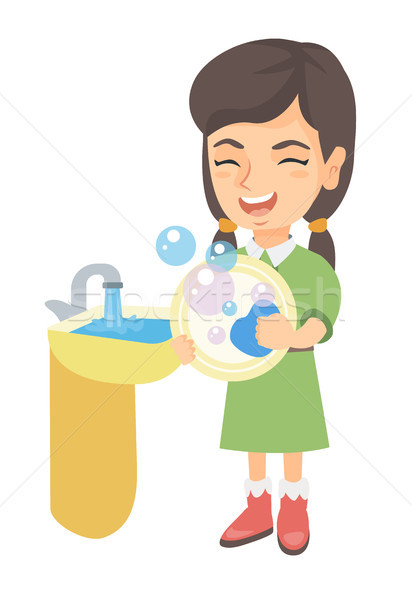 Little caucasian girl washing dishes in the sink. Stock photo © RAStudio