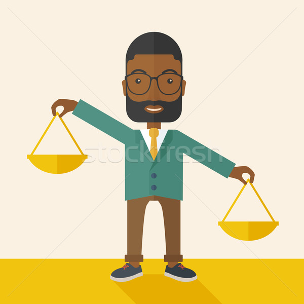 Black man holding a weighing scale. Stock photo © RAStudio