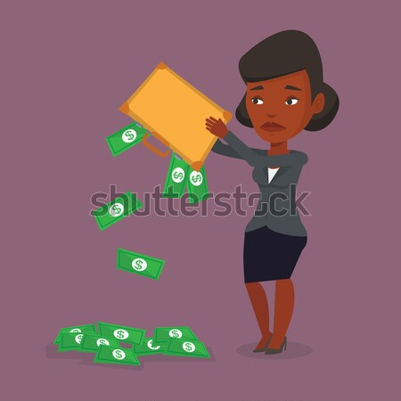 Bankrupt shaking out money from her briefcase. Stock photo © RAStudio