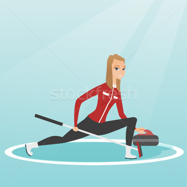 Stock photo: Sportswoman playing curling on a skating rink.