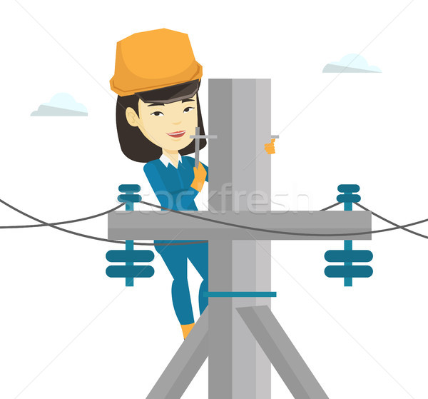 Electrician working on electric power pole. Stock photo © RAStudio