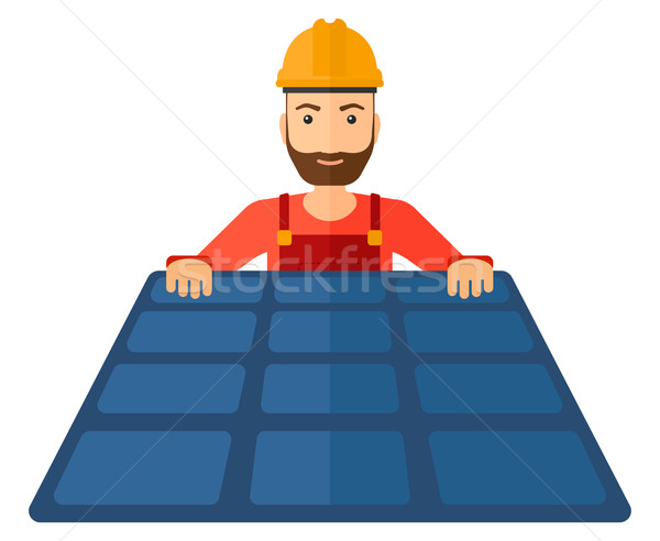 Constructor with solar panel. Stock photo © RAStudio