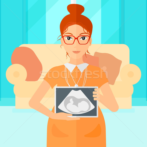 Donna incinta ultrasuoni immagine tablet soggiorno Foto d'archivio © RAStudio