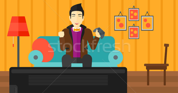 Man playing video game. Stock photo © RAStudio