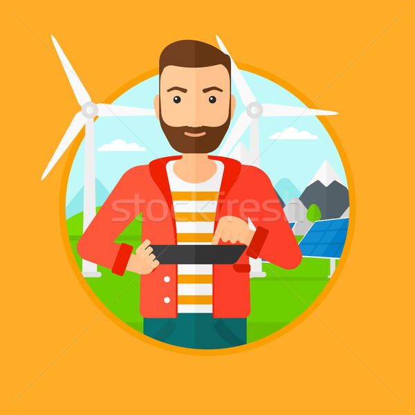 Masculino trabalhador energia solar planta parque eólico Foto stock © RAStudio