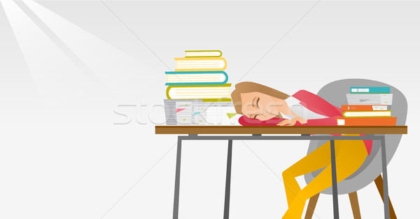 Female student sleeping at the desk with book. Stock photo © RAStudio