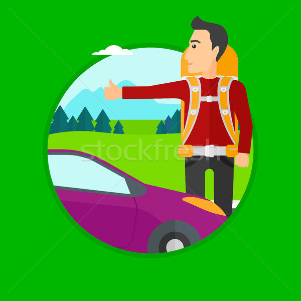 Young man hitchhiking. Stock photo © RAStudio