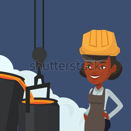 Steelworker in hardhat at work in the foundry. Stock photo © RAStudio