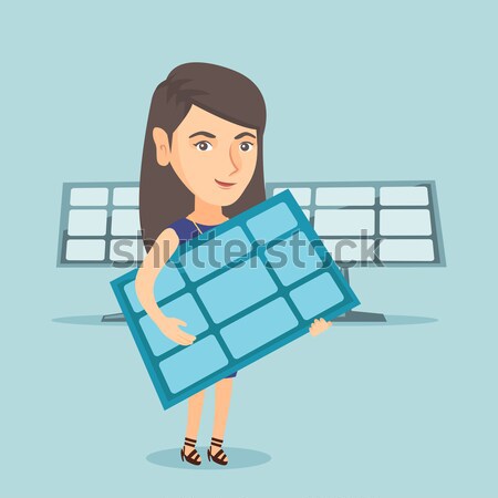 Woman holding solar panel vector illustration. Stock photo © RAStudio