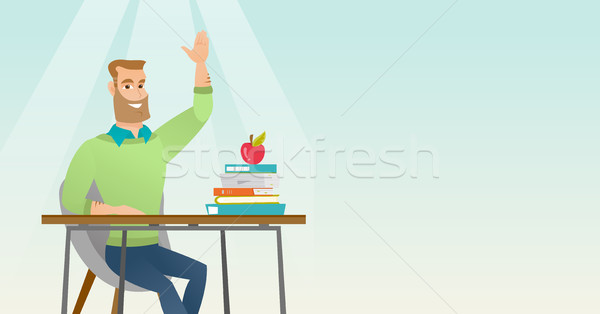 Student raising hand in class for an answer. Stock photo © RAStudio