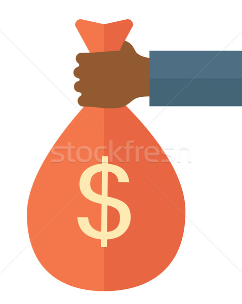 Black hand holding a bag with money. Stock photo © RAStudio