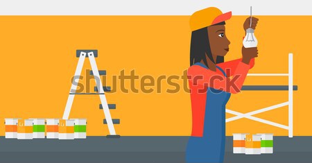 Background of wall with paint cans and ladder. Stock photo © RAStudio