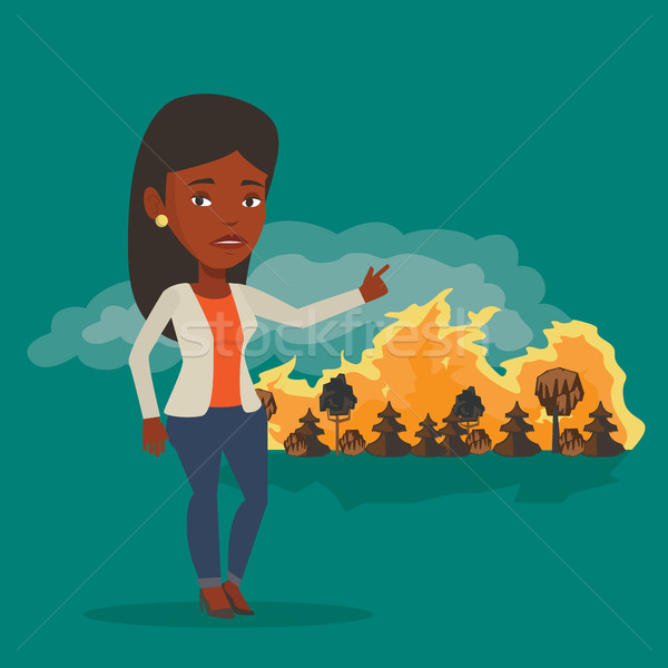 Mulher em pé fogo frustrado incêndio florestal indicação Foto stock © RAStudio
