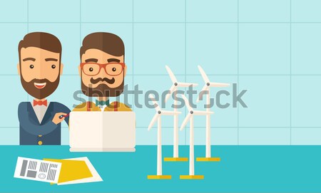 Man working with model of wind turbines. Stock photo © RAStudio