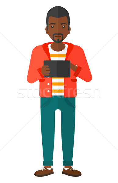 Man using tablet computer. Stock photo © RAStudio