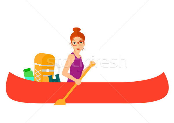 Stock photo: Woman riding in canoe.
