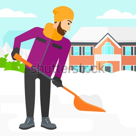 Man shoveling and removing snow. Stock photo © RAStudio