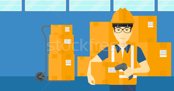Worker checking barcode on box. Stock photo © RAStudio