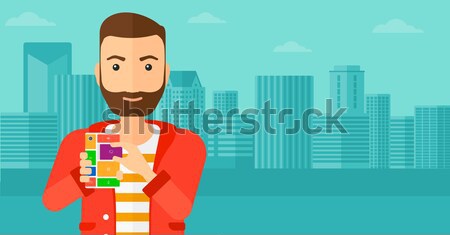Man with modular phone. Stock photo © RAStudio