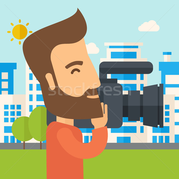 Cameraman with video camera Stock photo © RAStudio