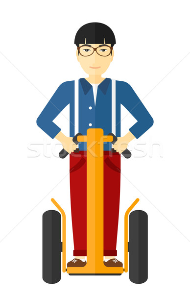 Man riding on electric scooter. Stock photo © RAStudio