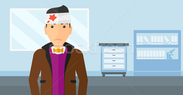 Man with injured head. Stock photo © RAStudio