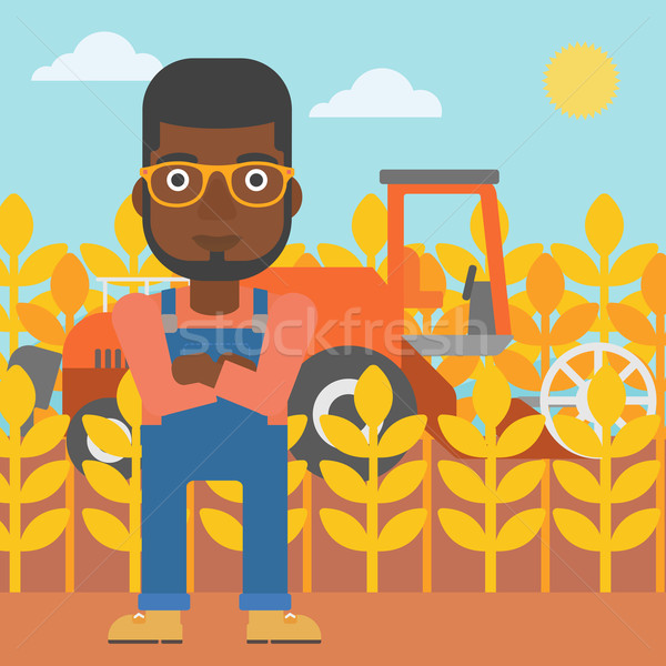 Man standing with combine on background. Stock photo © RAStudio