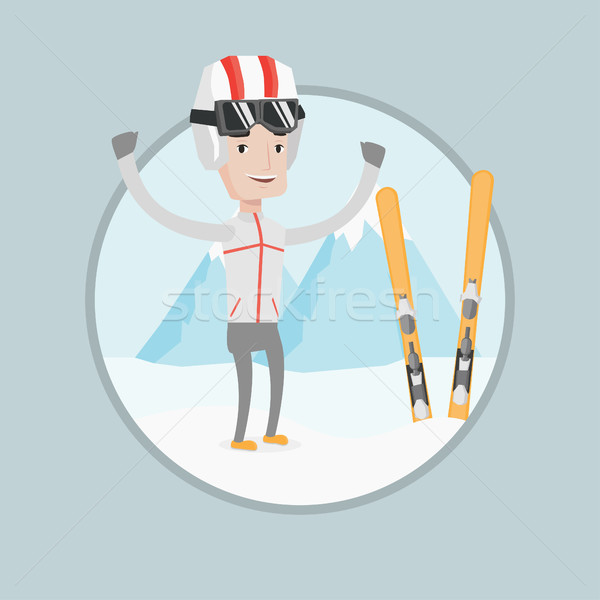 Wesoły narciarz stałego podniesionymi rękami górskich Zdjęcia stock © RAStudio