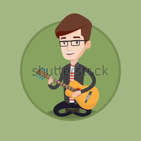Férfi játszik akusztikus gitár zenész ül gitár Stock fotó © RAStudio