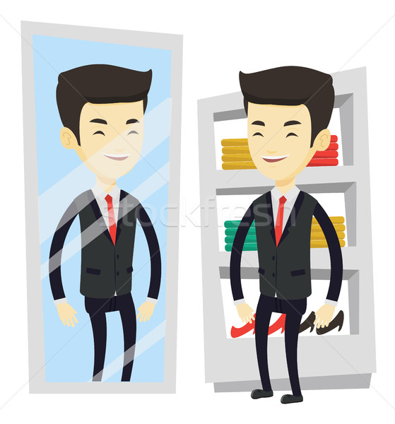 Man trying on clothes in dressing room. Stock photo © RAStudio