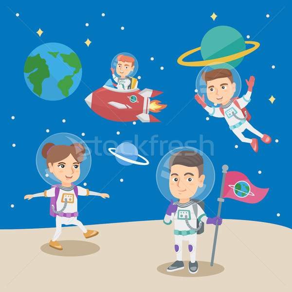 Group of little children playing in the astronauts Stock photo © RAStudio