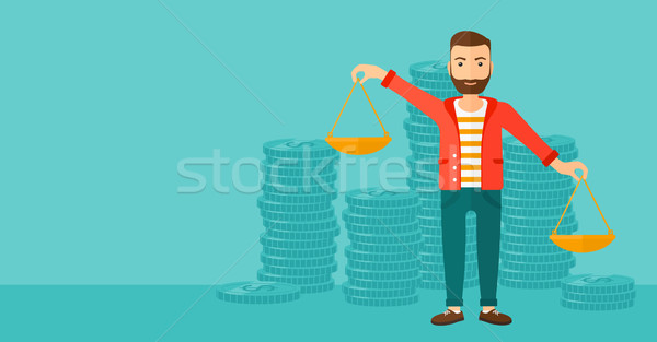 Businessman with scales. Stock photo © RAStudio