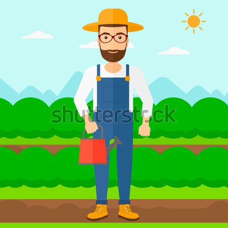 Lumberjack with chainsaw. Stock photo © RAStudio