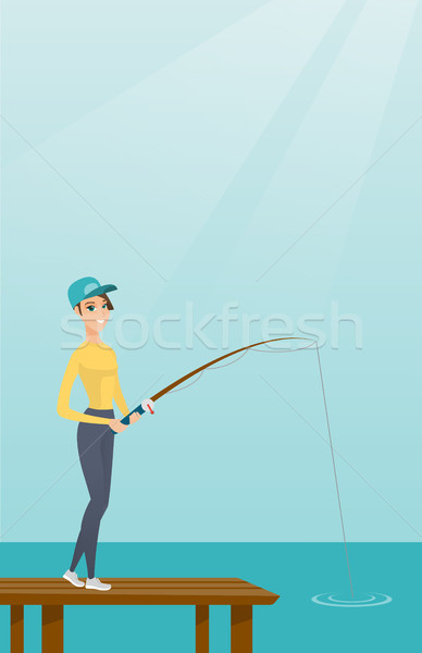 Young caucasian woman fishing on jetty. Stock photo © RAStudio