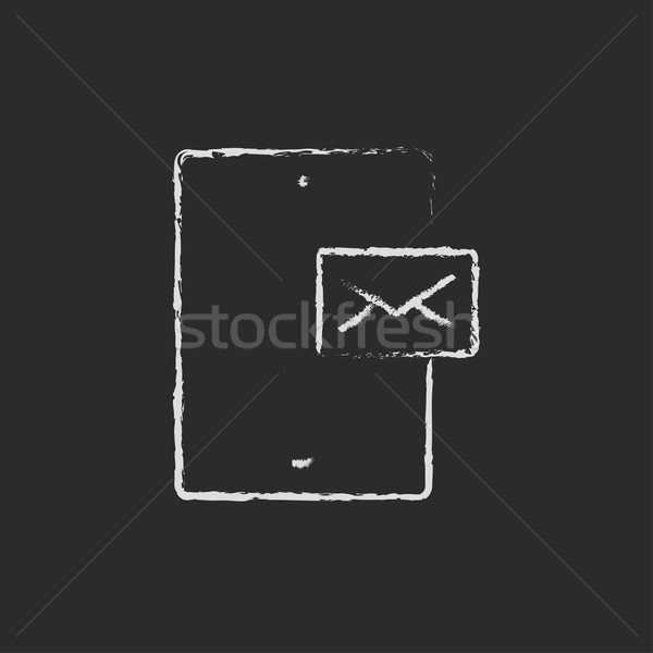 Touch screen phone with message icon drawn in chalk. Stock photo © RAStudio