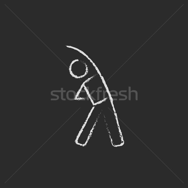 Man making exercises icon drawn in chalk. Stock photo © RAStudio