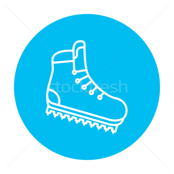 Hiking boot with crampons line icon. Stock photo © RAStudio