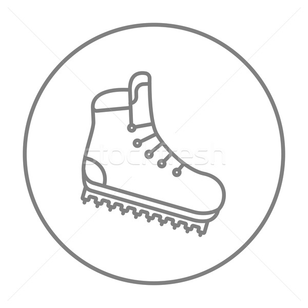 Hiking boot with crampons line icon. Stock photo © RAStudio