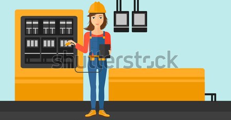 Electrician with electrical equipment. Stock photo © RAStudio