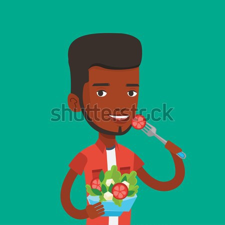 Uomo mangiare sano vegetali insalata Foto d'archivio © RAStudio