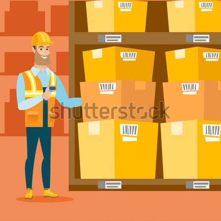 Warehouse worker scanning barcode on box. Stock photo © RAStudio