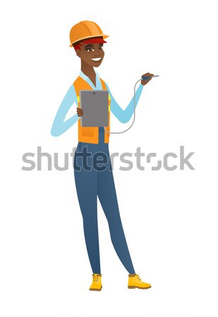 African electrician with electrical equipment. Stock photo © RAStudio